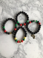 Load image into Gallery viewer, RED GREEN YELLOW AND BLACK BEADED BRACELETS