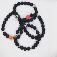 Load image into Gallery viewer, Lava stone Skull Bracelets
